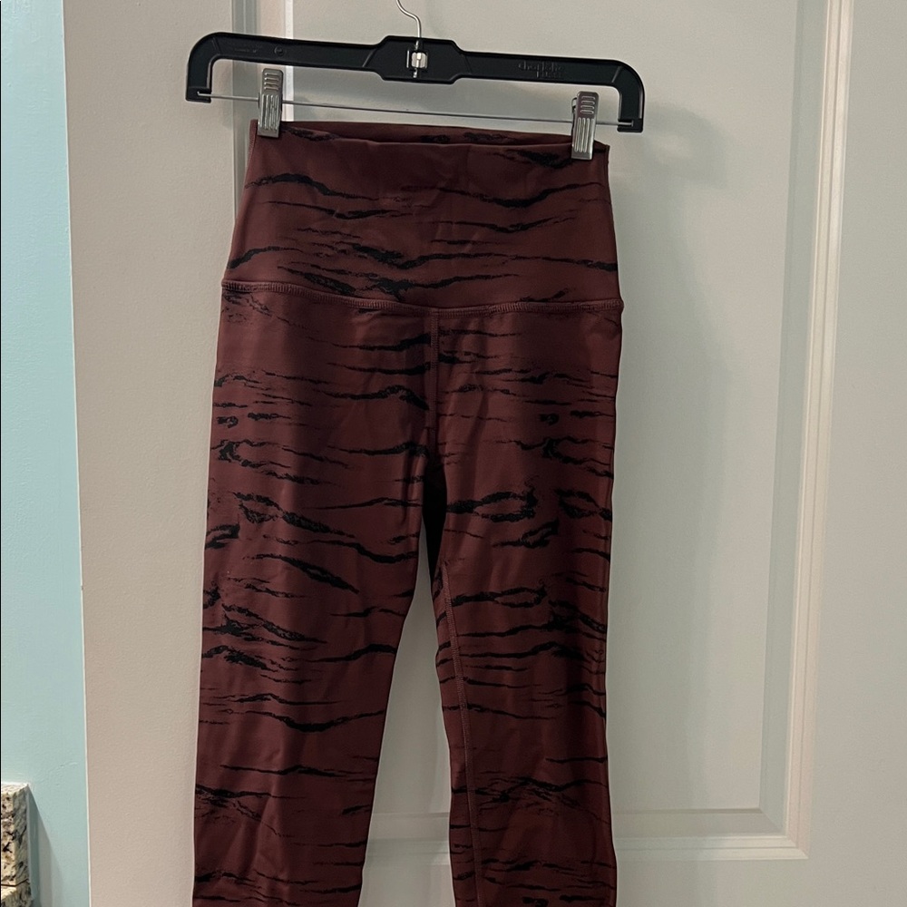 Beyond yoga maroon & black tiger print leggings